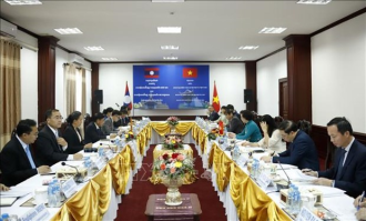 Vietnam, Laos pledge continued cooperation in home affairs